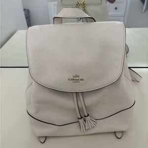 Coach White Backpack with Gold Accents and Tassel Detail